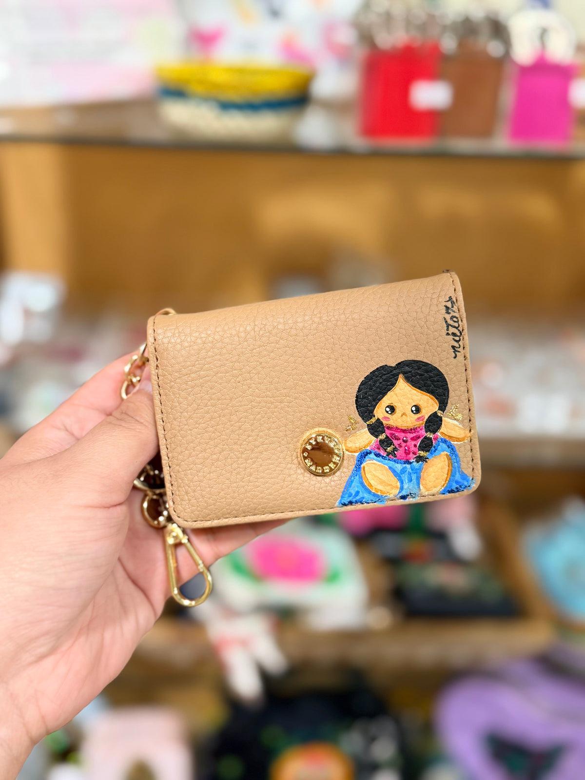 Muñeca wallet
