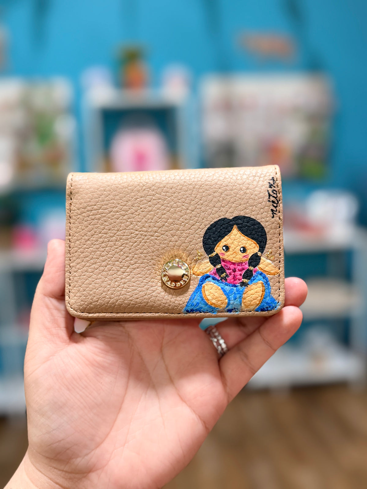 Muñeca wallet